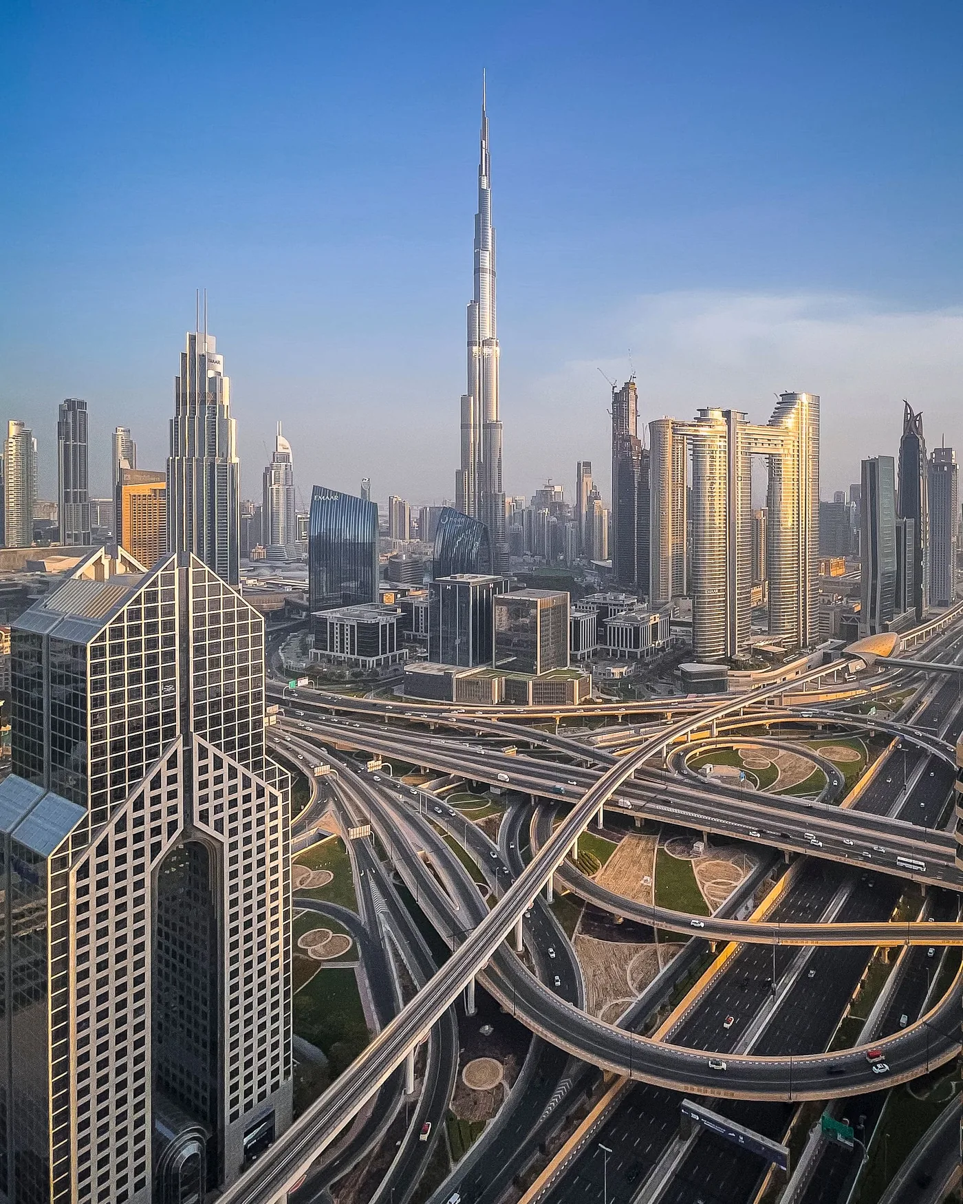 Aerial view of Downtown Dubai and the Burj Khalifa above the city's highways